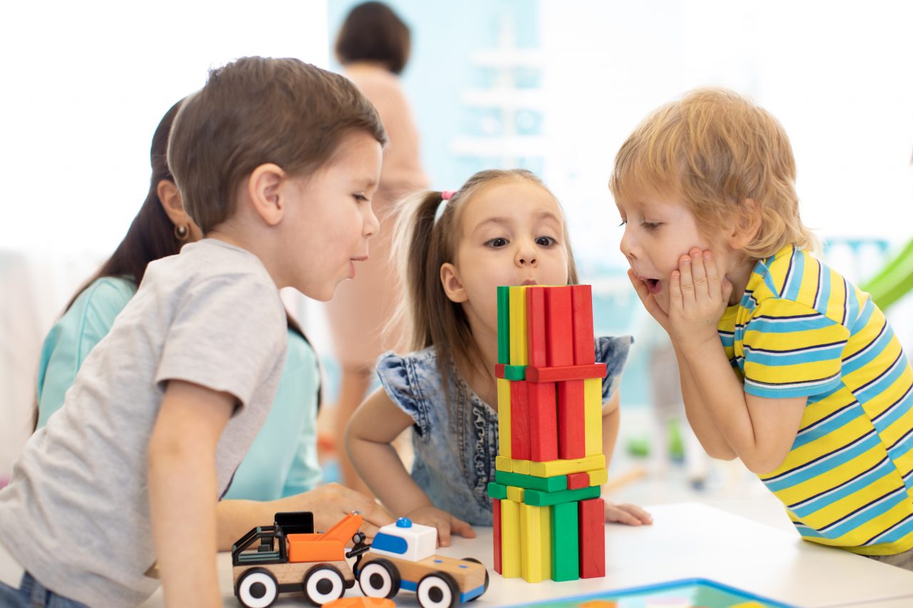 A photo of kids playing at the Children’s Autism Center.